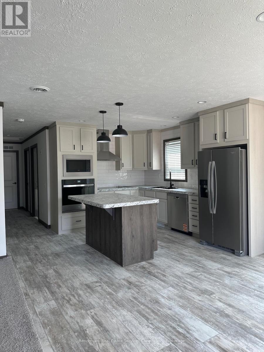 210 Spruce Drive, West Grey, Ontario  N4N 3B8 - Photo 8 - X12437909