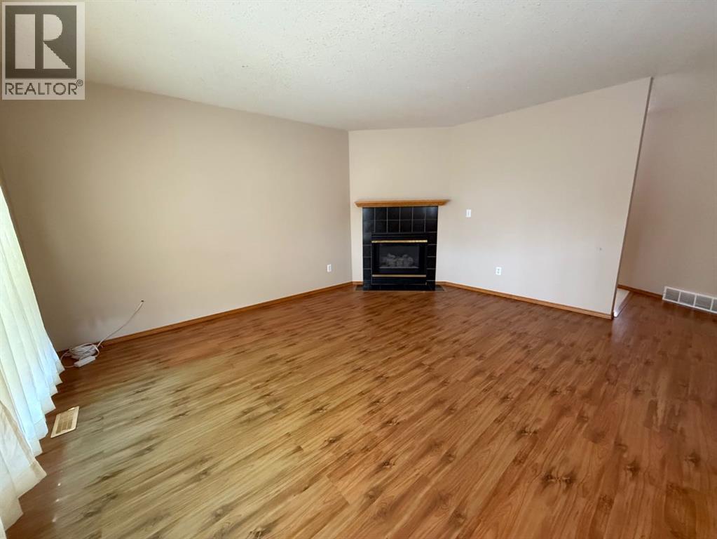 6224 Cypress Close, Olds, Alberta  T4H 1M7 - Photo 4 - A2244398