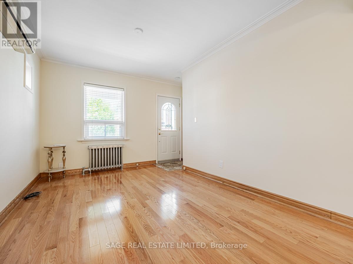 179 Livingstone Avenue, Toronto, Ontario  M6E 2L9 - Photo 6 - W12437870