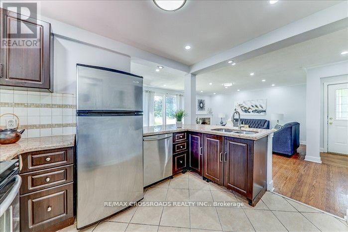 2 Tangmere Rd (Main) Road, Toronto, Ontario  M3B 2N1 - Photo 14 - C12437955