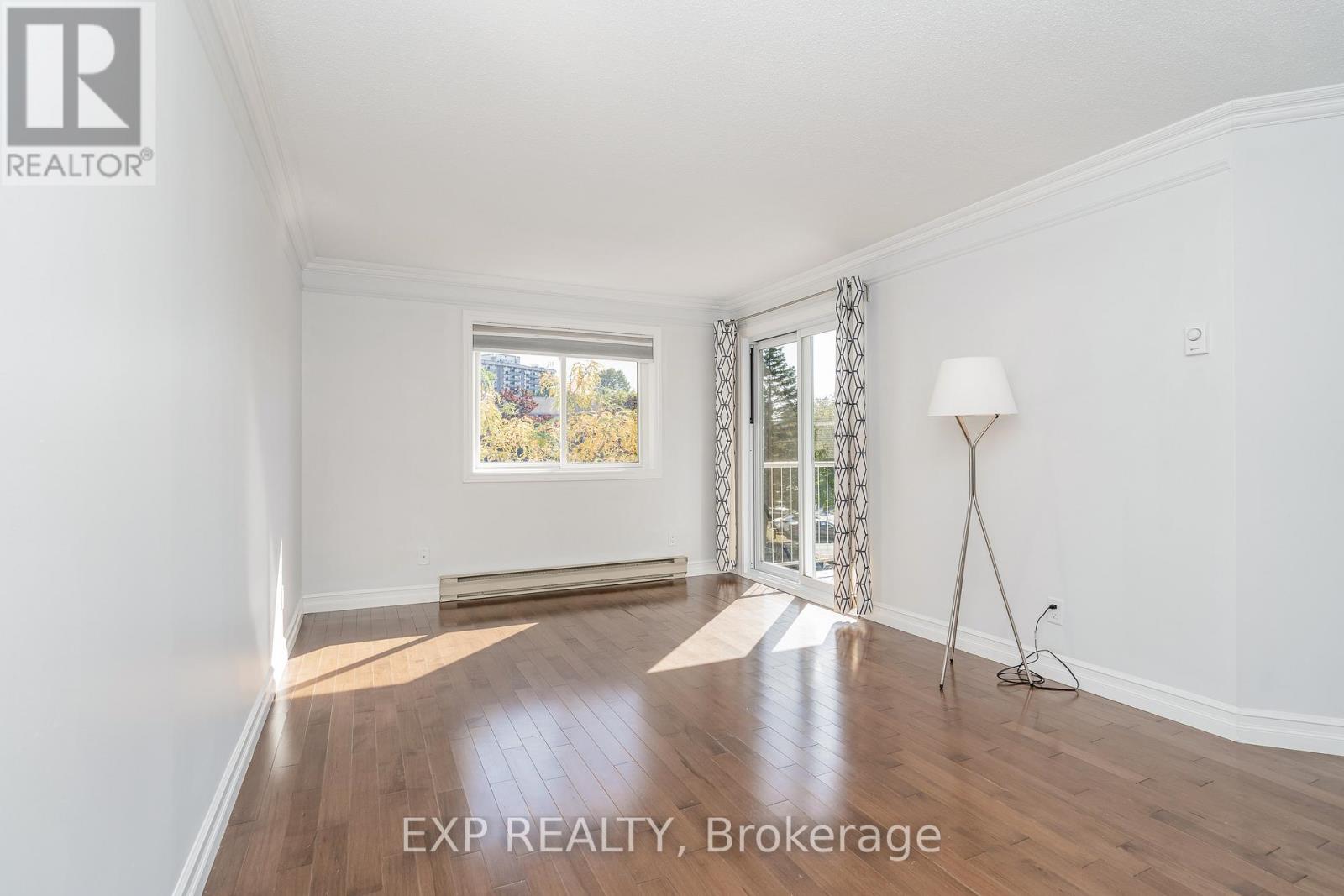 317 - 270 Brittany Drive, Ottawa, Ontario  K1K 4M3 - Photo 5 - X12438170