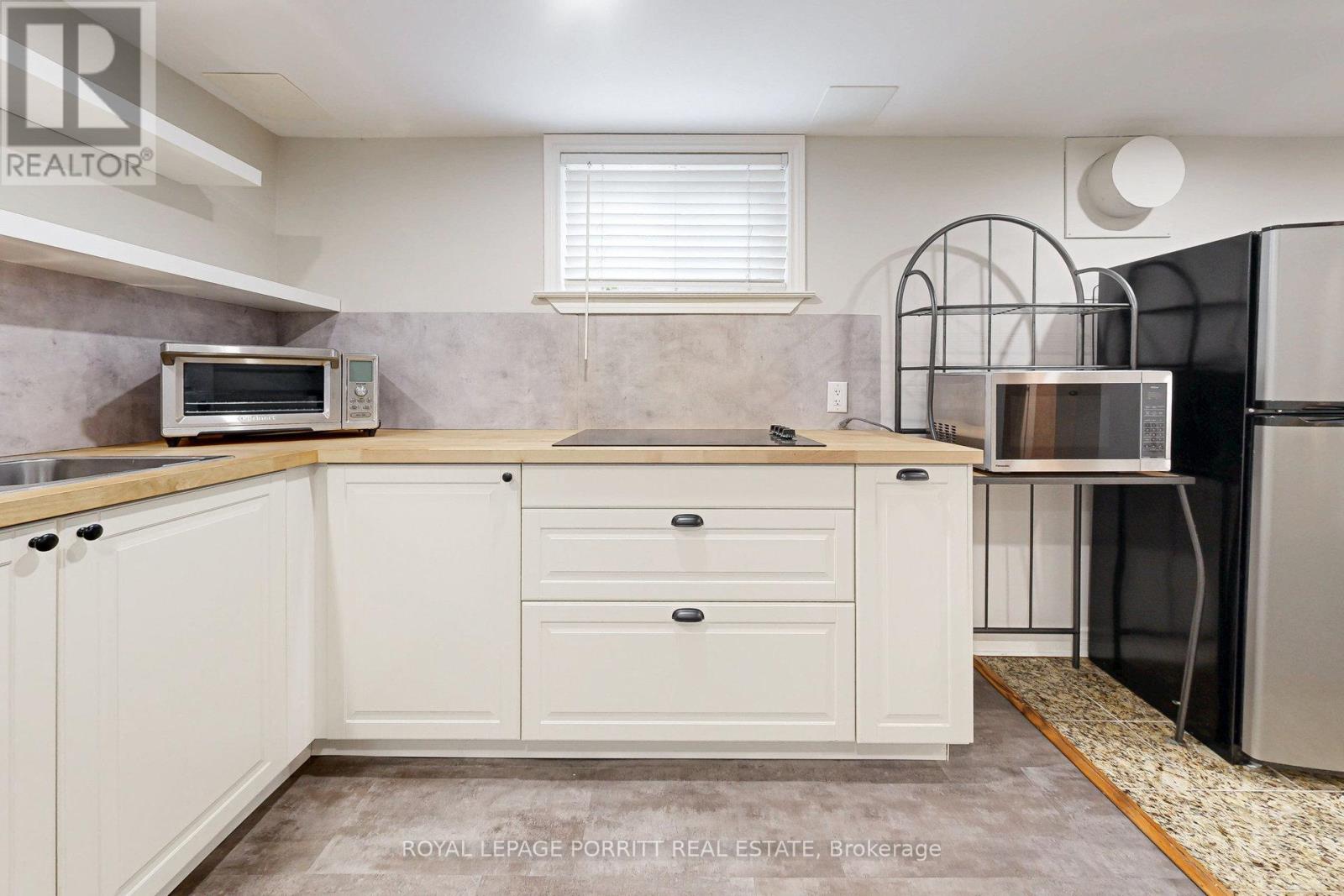 B - 73 Gort Avenue, Toronto, Ontario  M8W 3Y9 - Photo 5 - W12438005