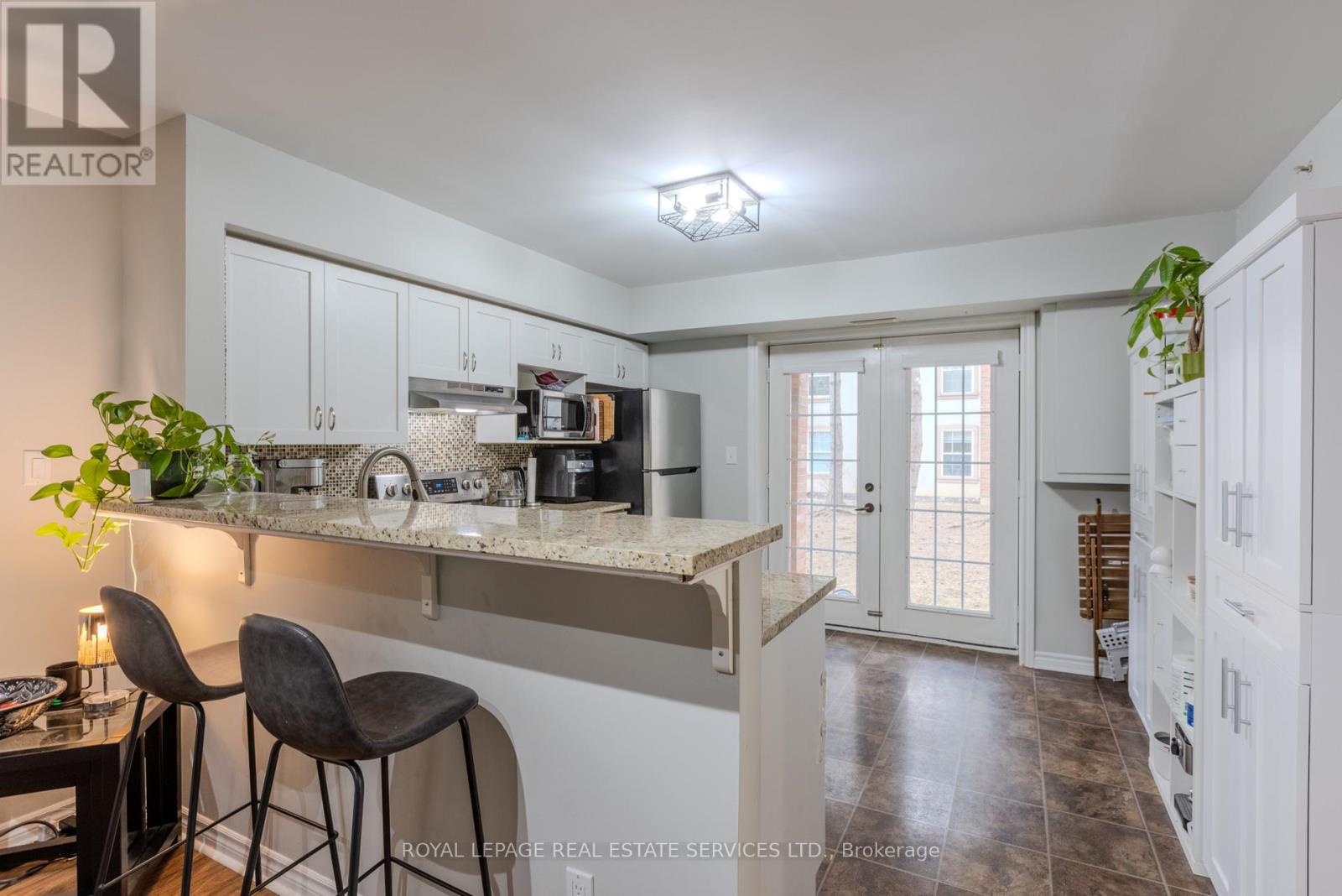 107 - 4013 Kilmer Drive, Burlington, Ontario  L7M 4M3 - Photo 4 - W12438014