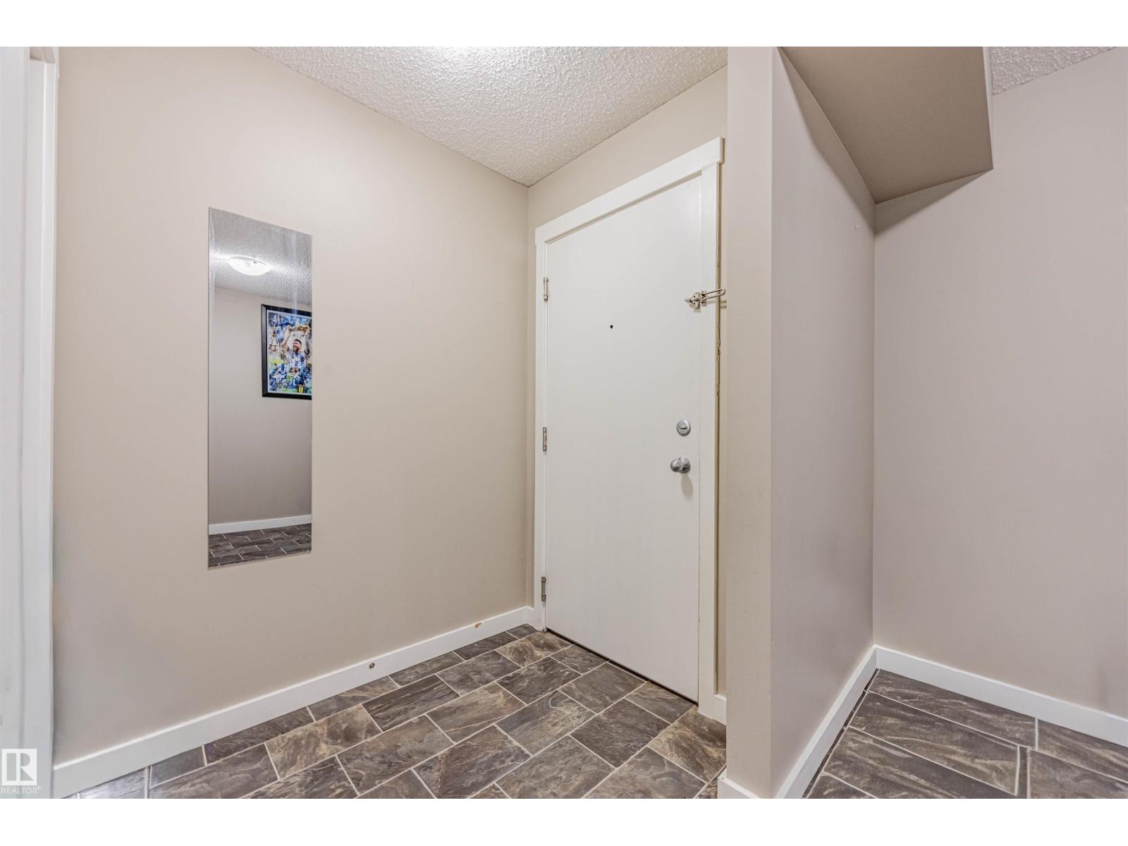 #202 5816 Mullen Pl Nw, Edmonton, Alberta  T6R 0W3 - Photo 2 - E4460275
