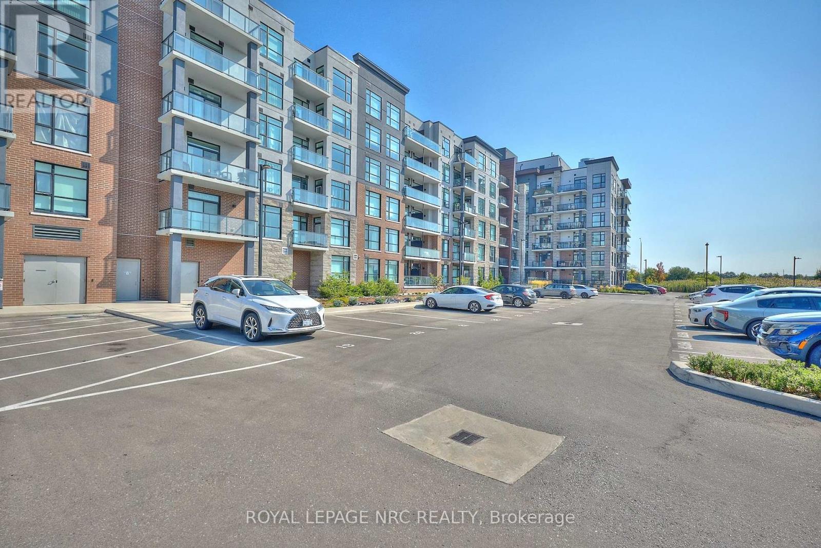 221 - 600 North Service Road, Hamilton (Lakeshore), Ontario  L8E 0L2 - Photo 1 - X12438189