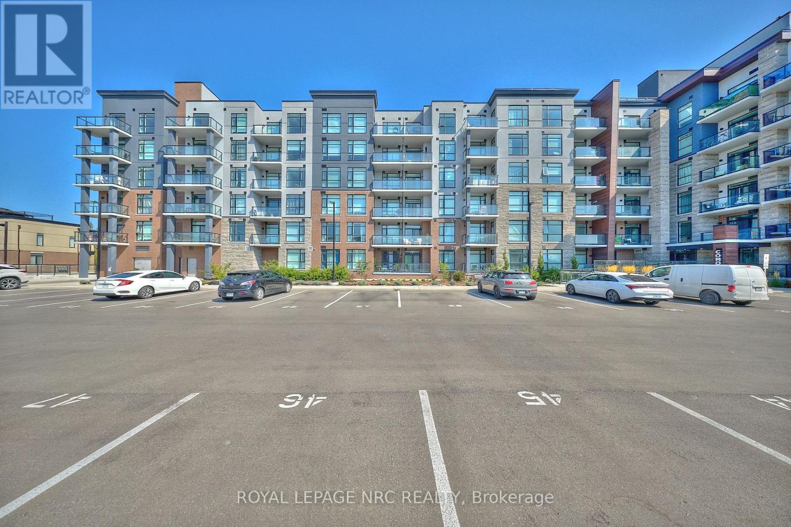 221 - 600 North Service Road, Hamilton (Lakeshore), Ontario  L8E 0L2 - Photo 2 - X12438189