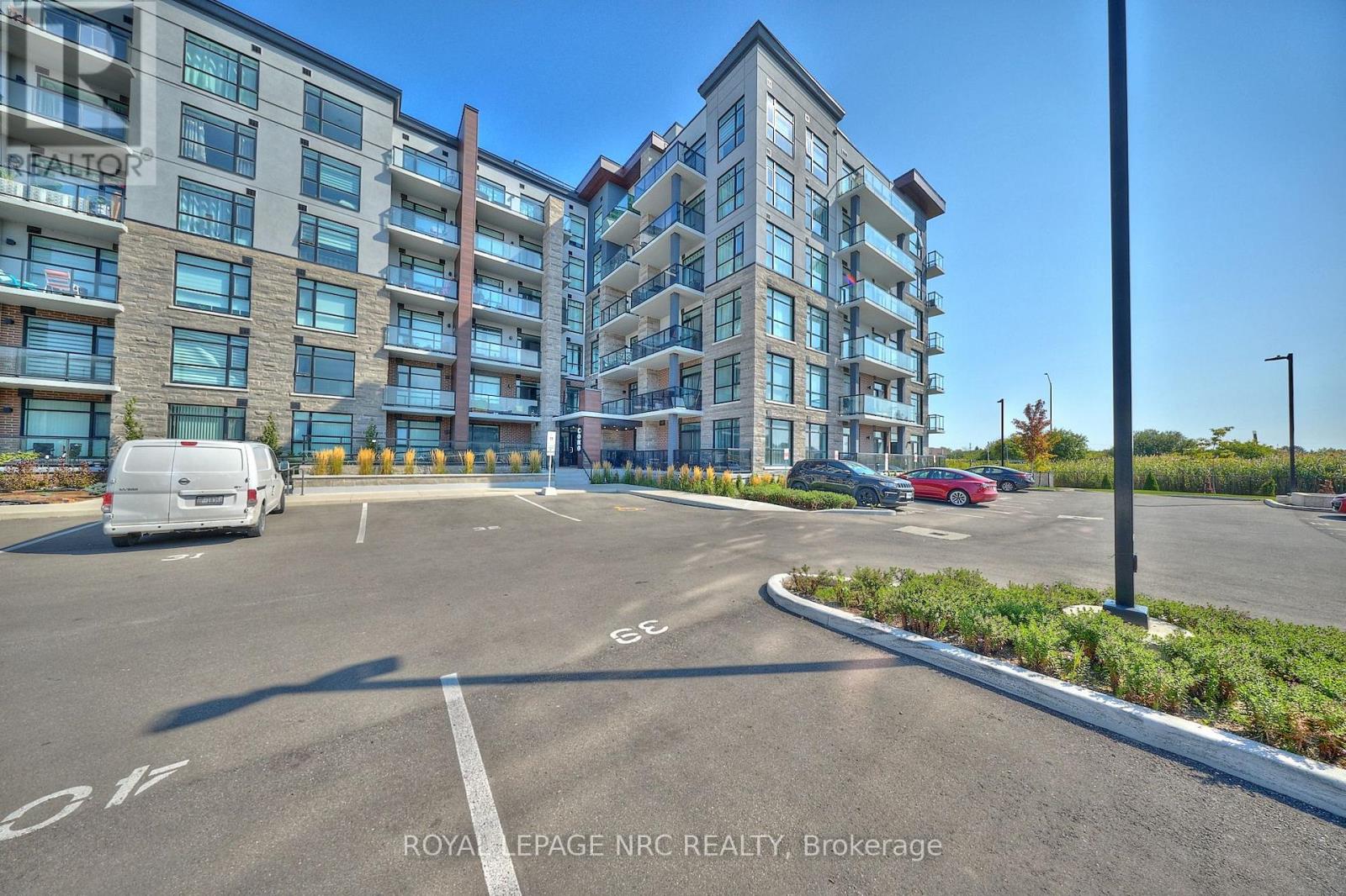 221 - 600 North Service Road, Hamilton (Lakeshore), Ontario  L8E 0L2 - Photo 3 - X12438189