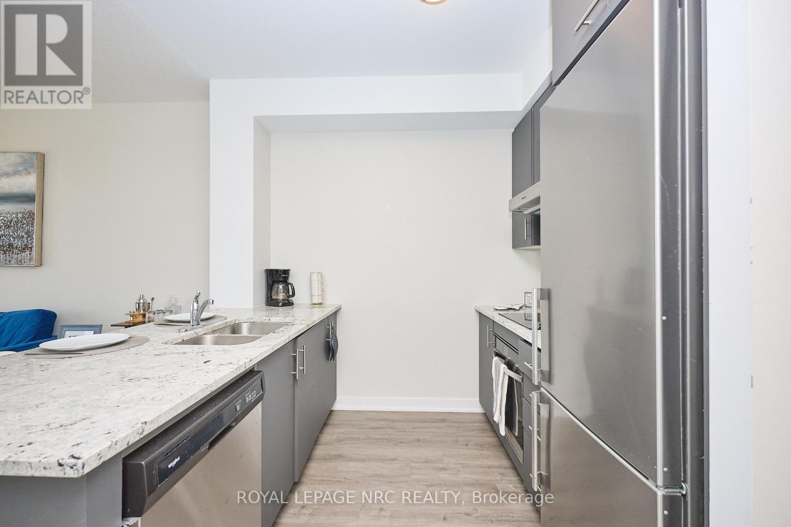 221 - 600 North Service Road, Hamilton (Lakeshore), Ontario  L8E 0L2 - Photo 9 - X12438189