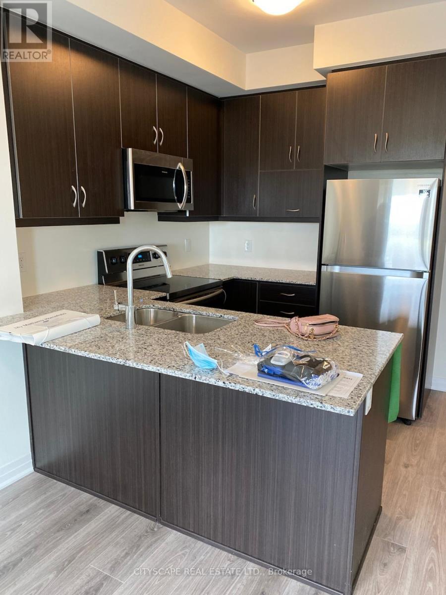 219 - 128 Grovewood Common, Oakville, Ontario  L6H 0X3 - Photo 3 - W12438266