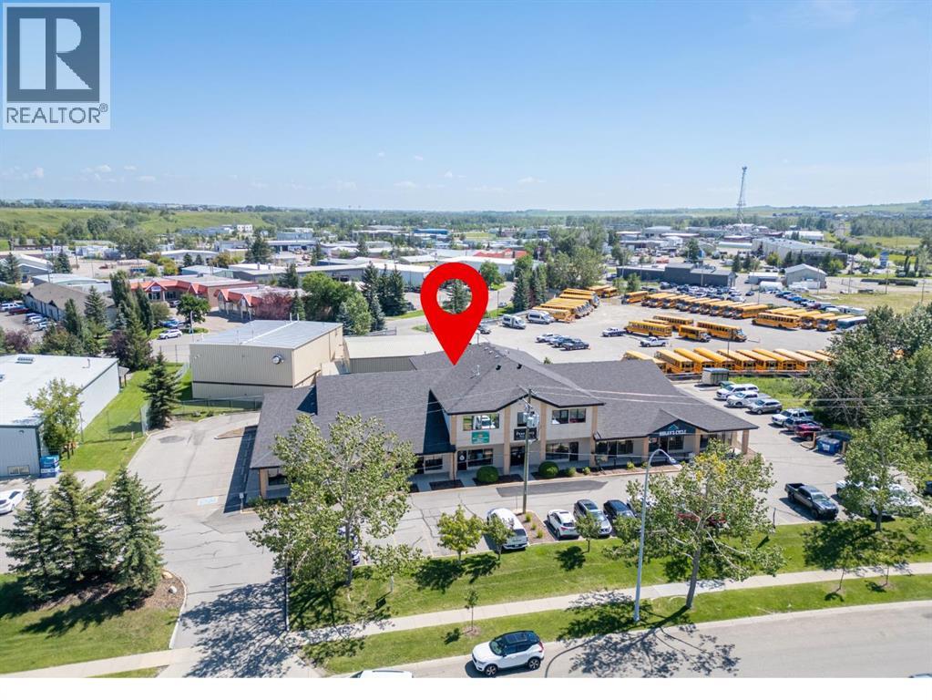 200, 14 Crystalridge Drive, Okotoks, Alberta  T1S 2C3 - Photo 1 - A2196830