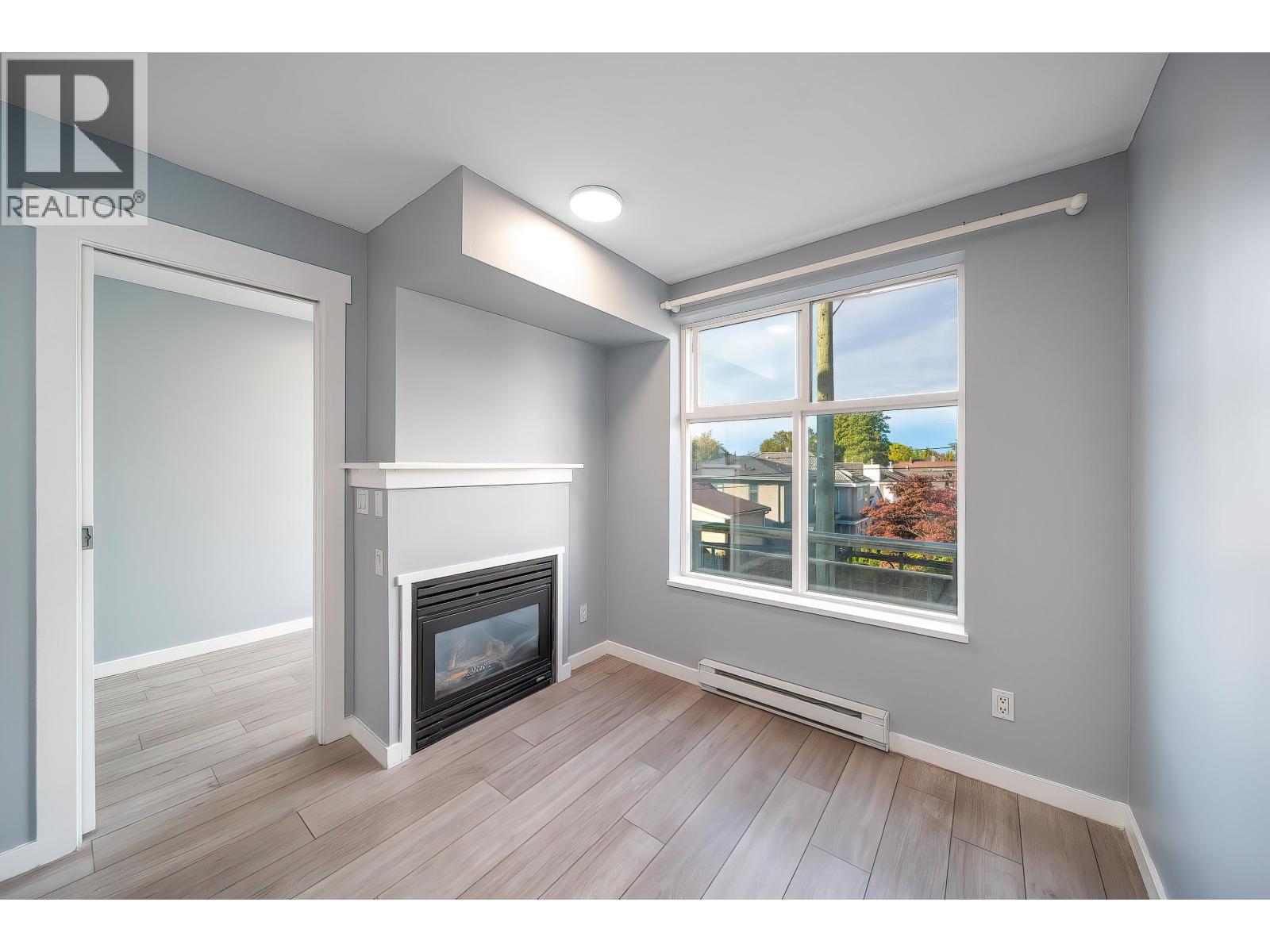 312 1503 W 65th Avenue, Vancouver, British Columbia  V6P 6Y8 - Photo 2 - R3053325