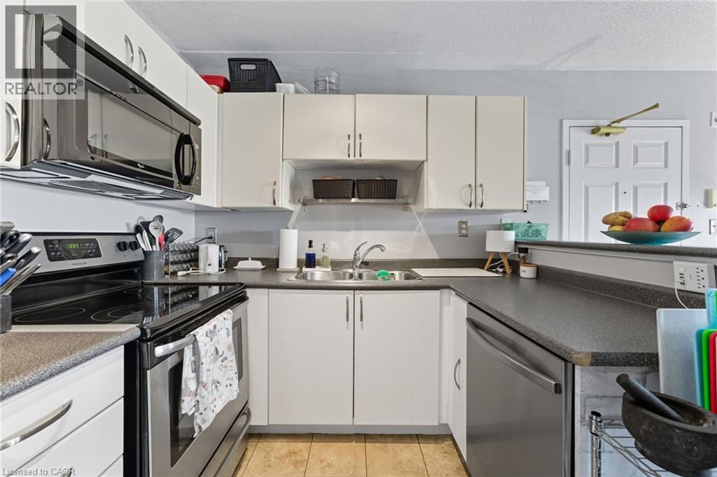 1421 Walkers Line Unit# 304, Burlington, Ontario  L7M 4P4 - Photo 6 - 40775506