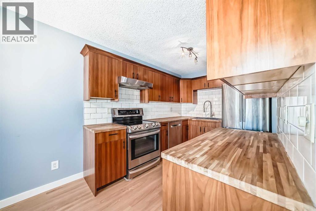 42 Pennsburg Way Se, Calgary, Alberta  T2A 2J5 - Photo 3 - A2259702