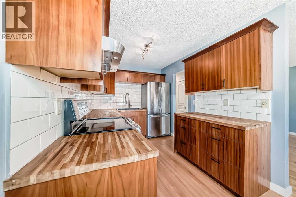 42 Pennsburg Way Se, Calgary, Alberta  T2A 2J5 - Photo 4 - A2259702