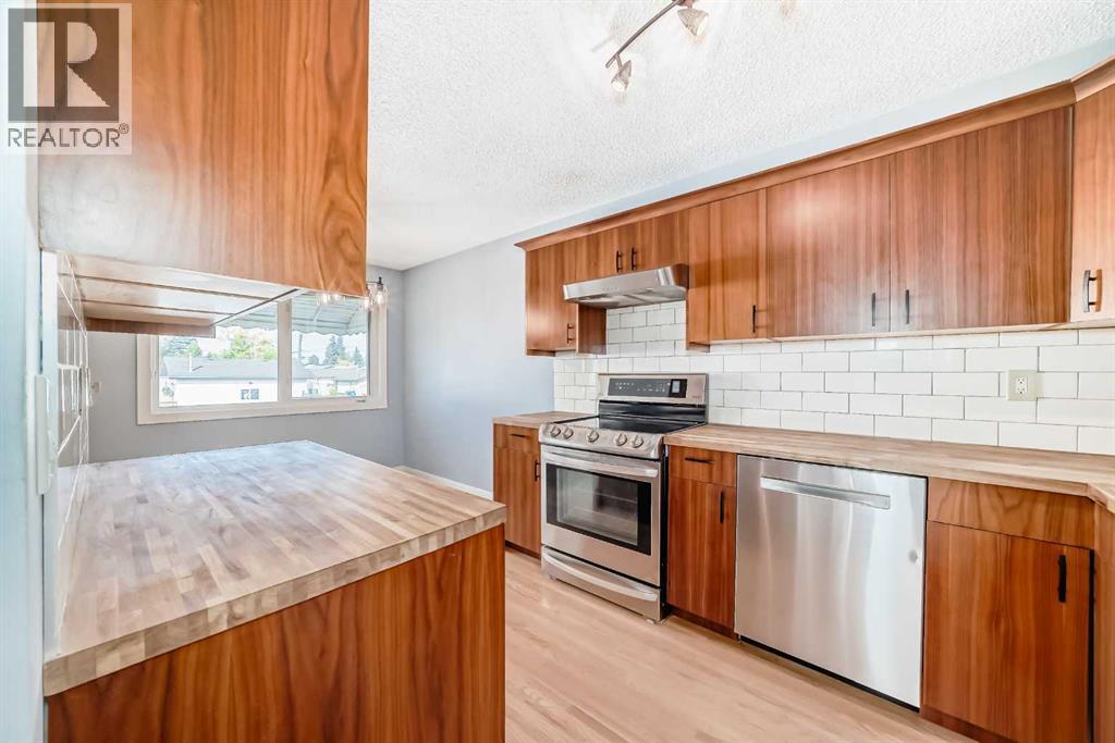 42 Pennsburg Way Se, Calgary, Alberta  T2A 2J5 - Photo 7 - A2259702