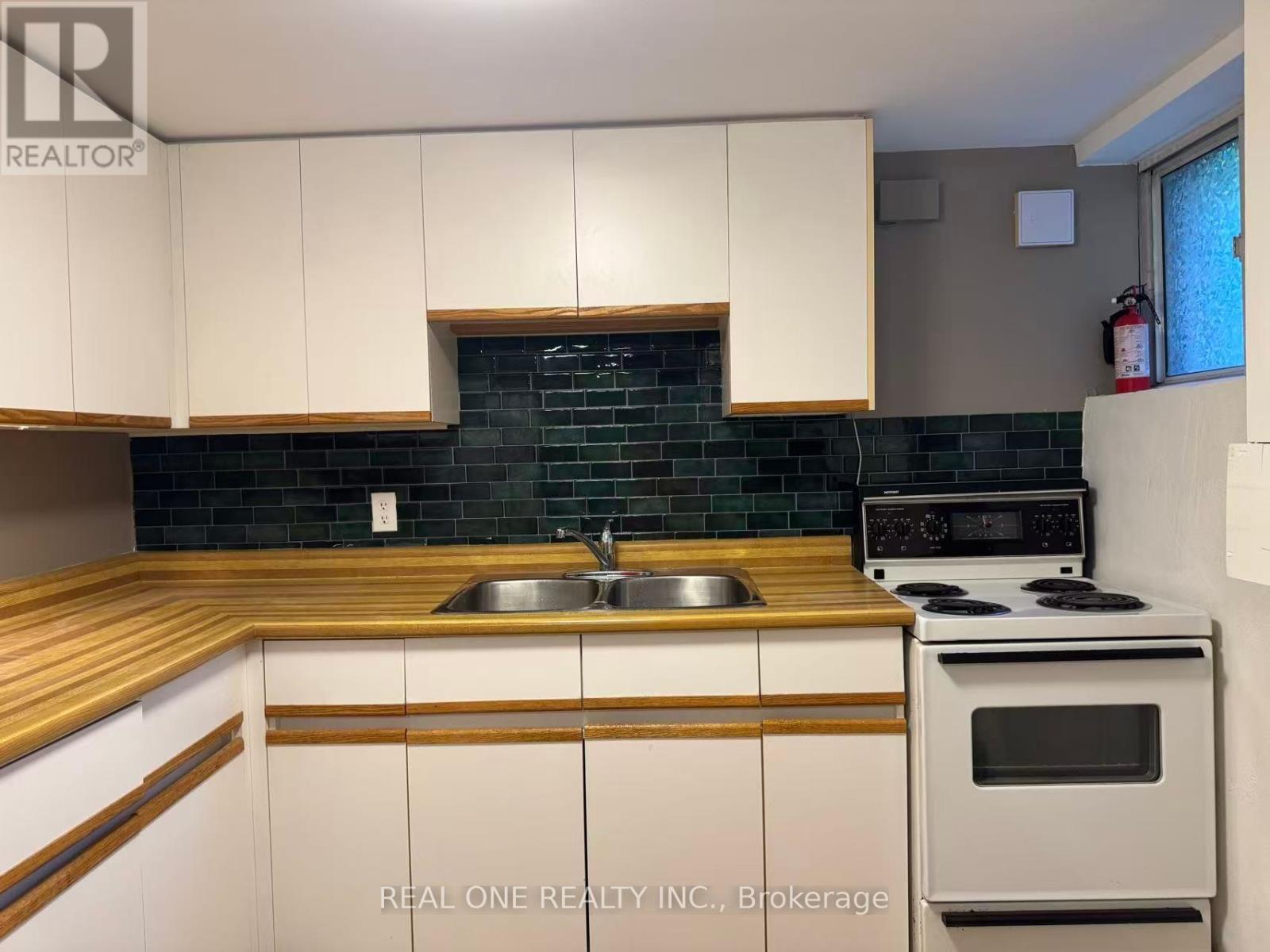 Basement - 391 Parkside Drive, Toronto, Ontario  M6R 2Z7 - Photo 8 - W12437641