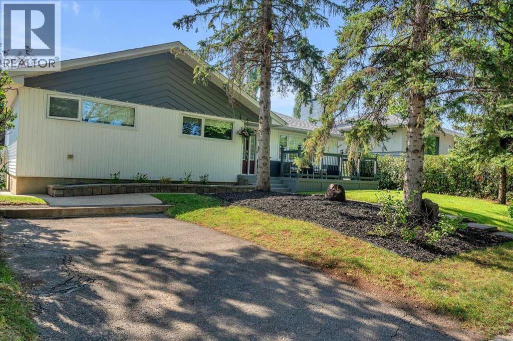85 Warwick Drive Sw, Calgary, Alberta  T3C 2R5 - Photo 5 - A2254403