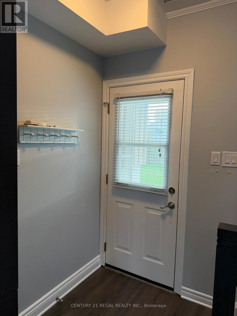 1 - 770 Applewood Crescent, Milton, Ontario  L9T 3C4 - Photo 4 - W12438694