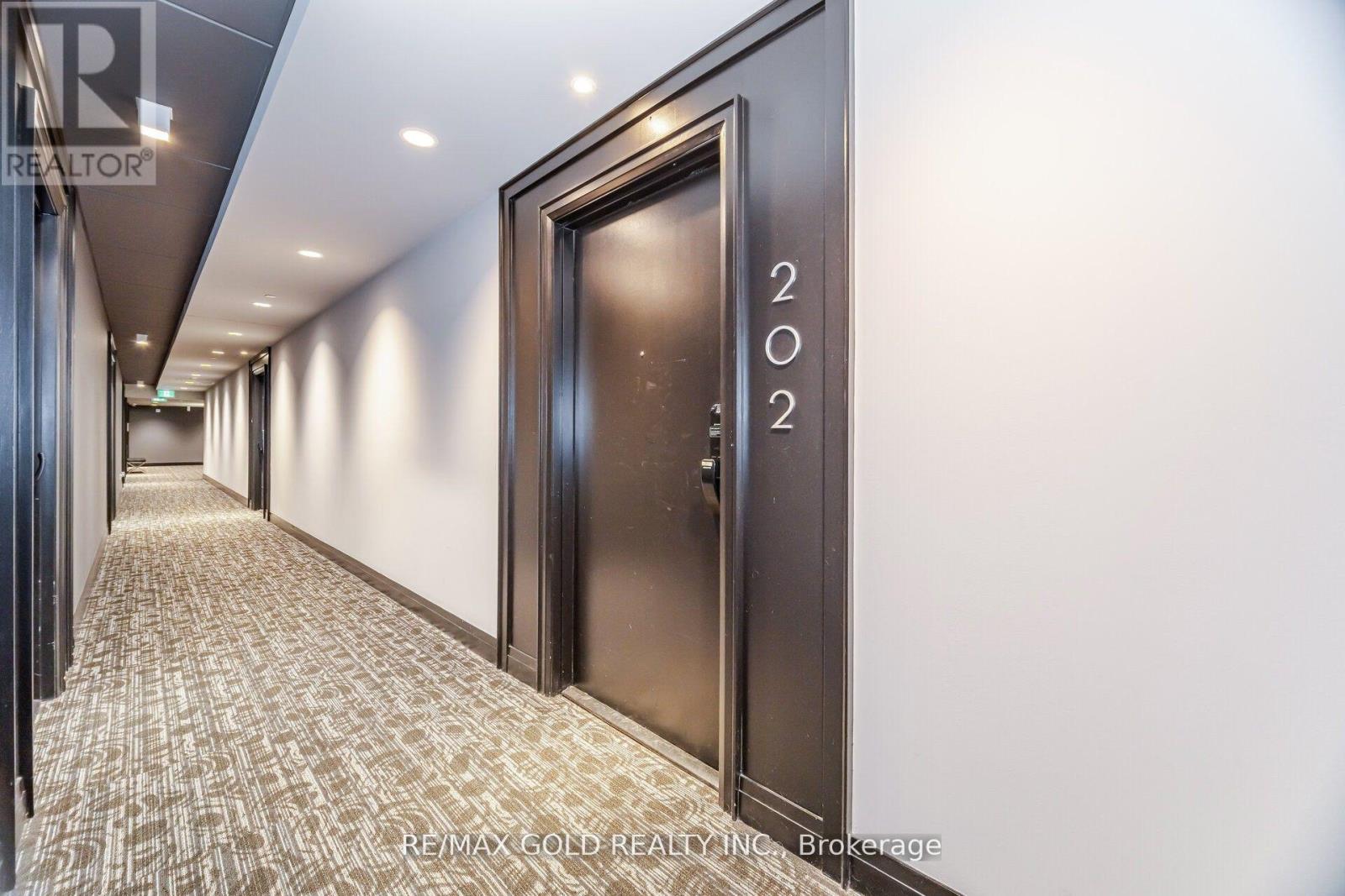 202 - 95 Dundas Street, Oakville, Ontario  L6M 5N4 - Photo 3 - W12438764