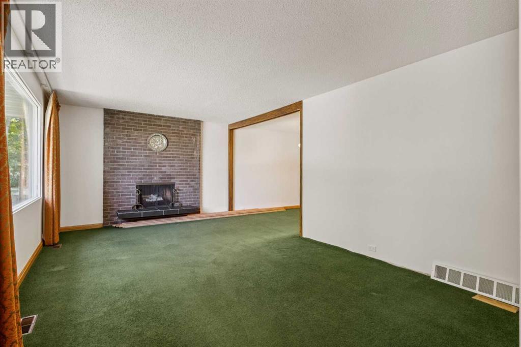 5031 Vienna Drive Nw, Calgary, Alberta  T3A 0W8 - Photo 3 - A2258794