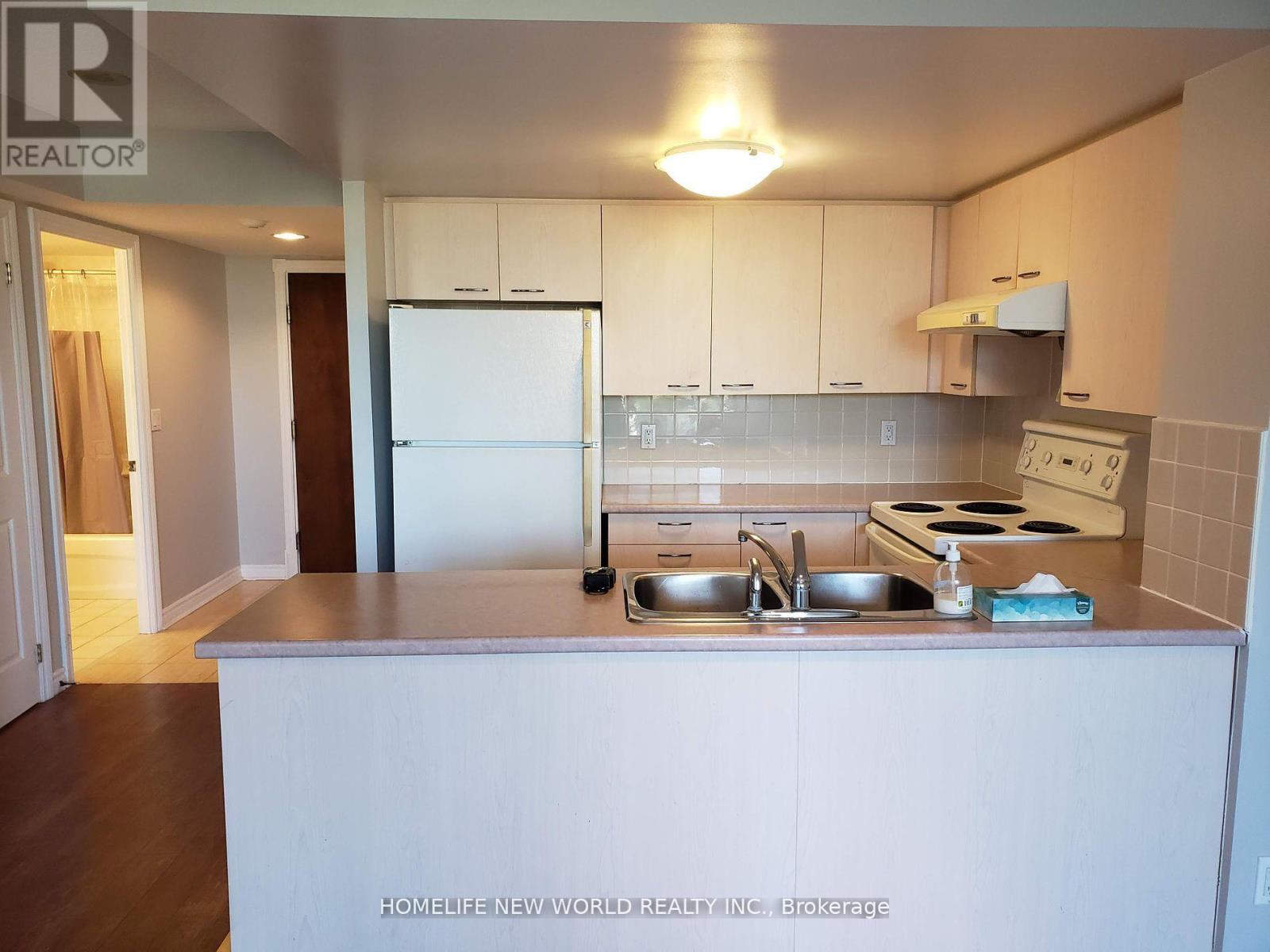 301 - 130 Pond Drive, Markham, Ontario  L3T 7W5 - Photo 5 - N12438821