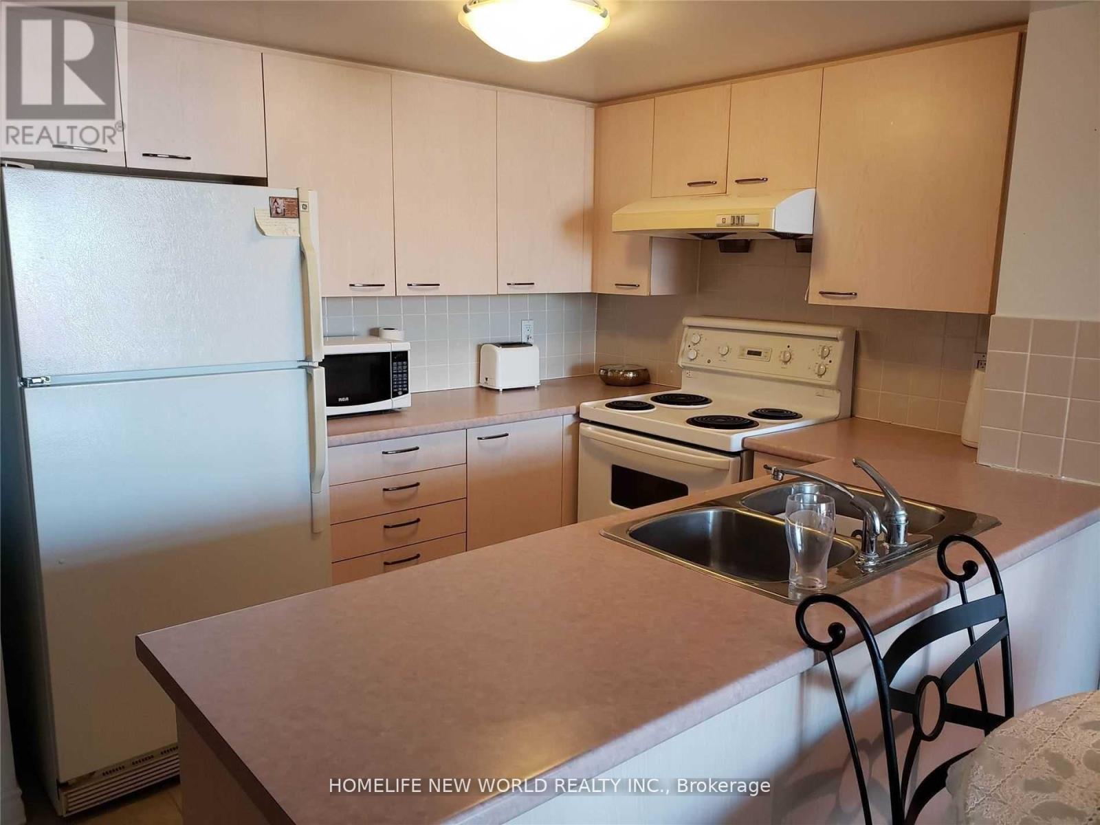 301 - 130 Pond Drive, Markham, Ontario  L3T 7W5 - Photo 6 - N12438821