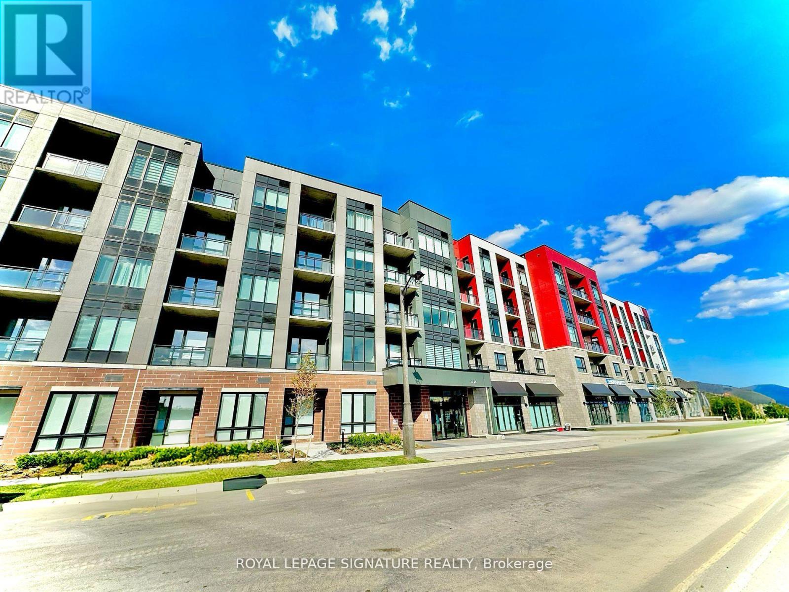 215 - 3265 Carding Mill Trail, Oakville, Ontario  L6M 1S1 - Photo 1 - W12438876