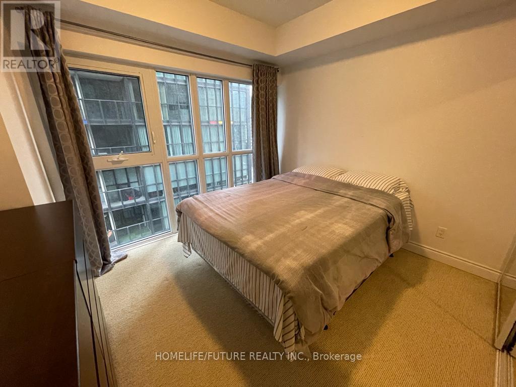 1002 - 28 Ted Rogers Way, Toronto, Ontario  M4Y 2J4 - Photo 6 - C12438938