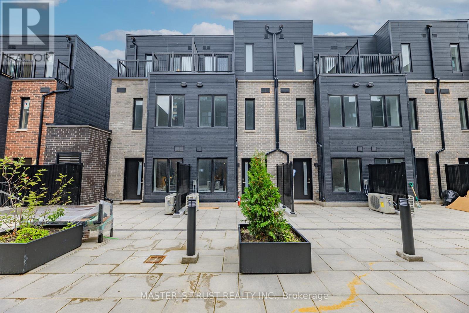 54 - 10 Calamint Lane, Toronto, Ontario  M1W 2H1 - Photo 2 - N12425125