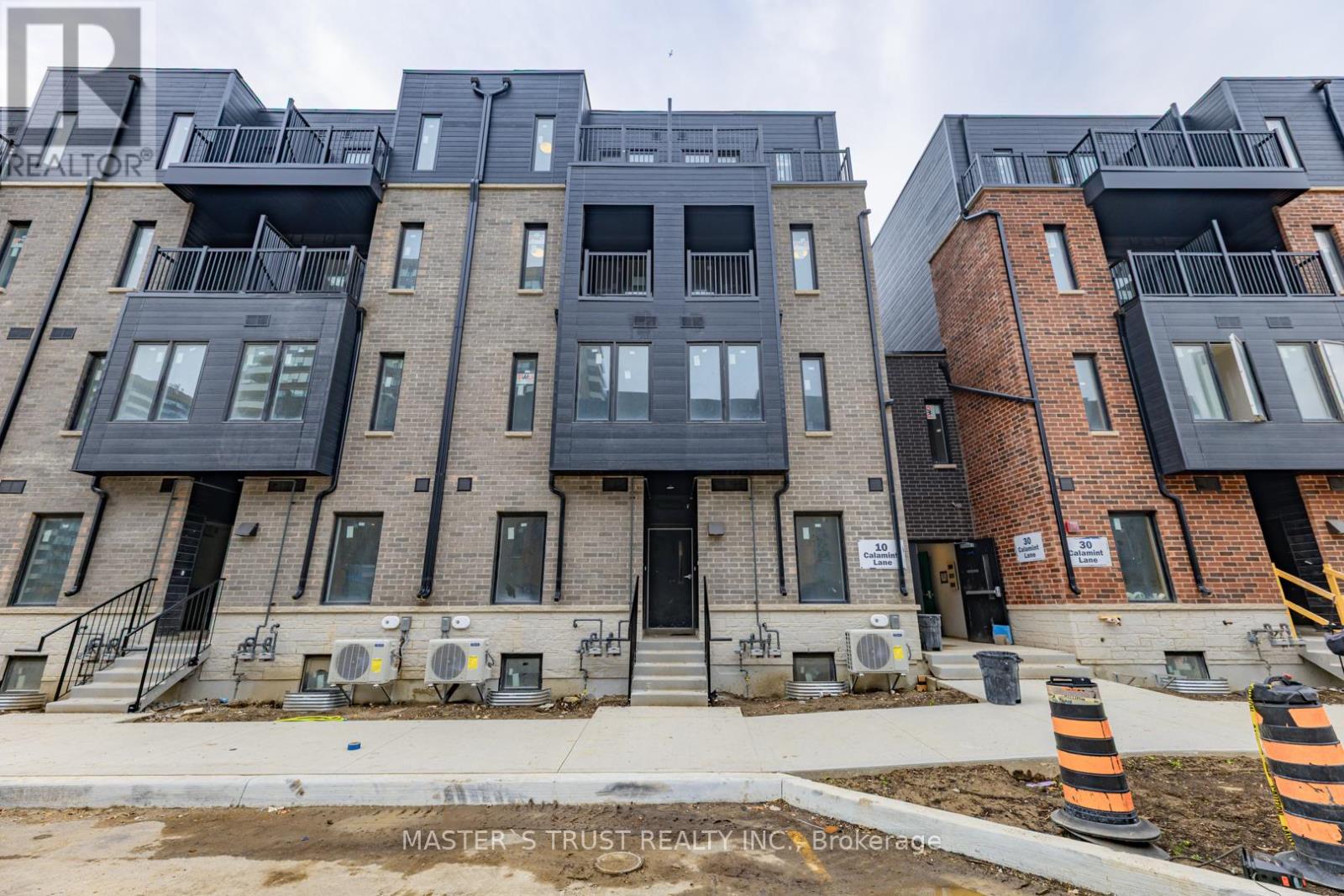 54 - 10 Calamint Lane, Toronto, Ontario  M1W 2H1 - Photo 3 - N12425125
