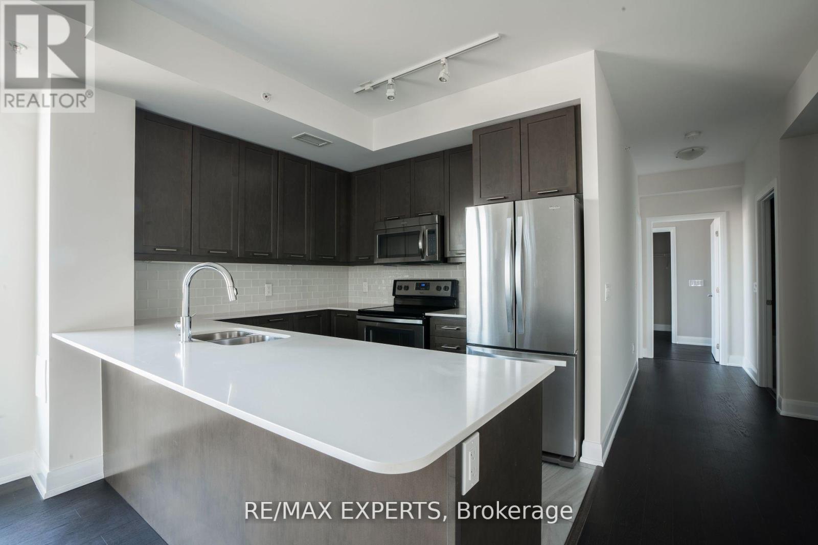 210 - 2480 Prince Michael Drive, Oakville, Ontario  L6H 0H1 - Photo 6 - W12438960
