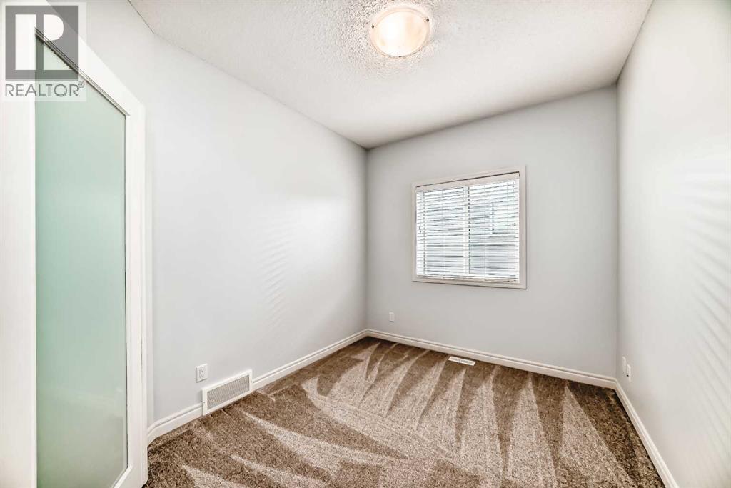 410 Panatella Square Nw, Calgary, Alberta  T3K 0T7 - Photo 5 - A2257513