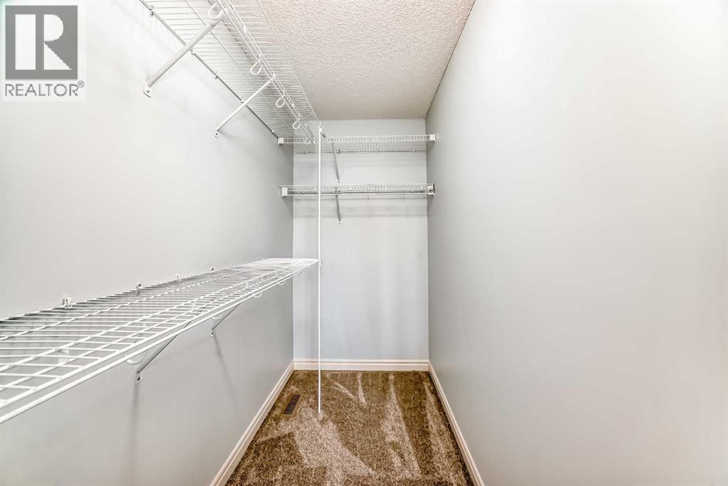 410 Panatella Square Nw, Calgary, Alberta  T3K 0T7 - Photo 29 - A2257513