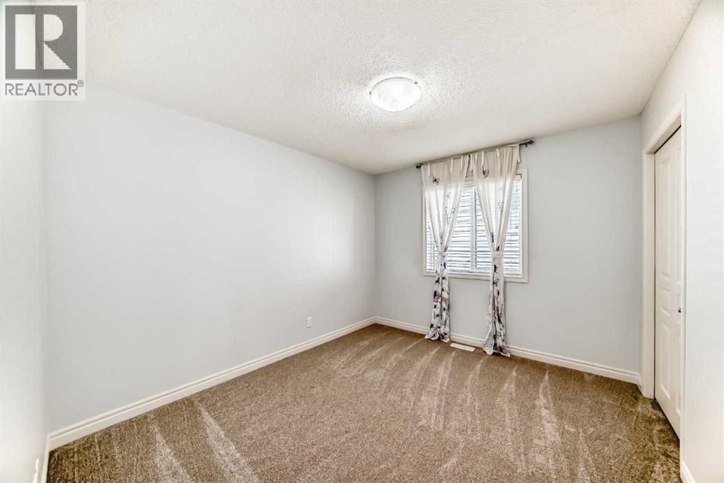 410 Panatella Square Nw, Calgary, Alberta  T3K 0T7 - Photo 31 - A2257513