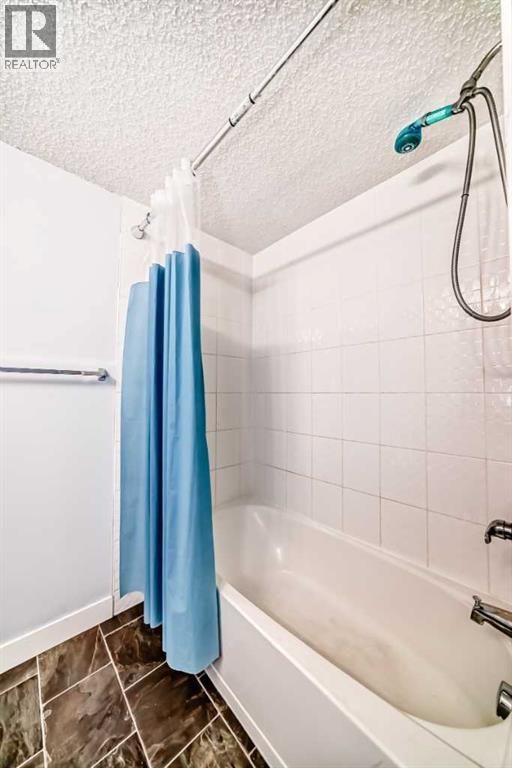 205, 5 Saddlestone Way Ne, Calgary, Alberta  T3J 0S2 - Photo 31 - A2220772