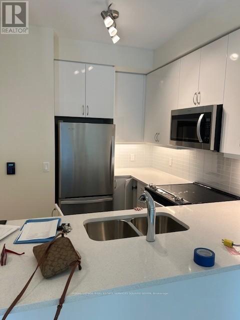 303 - 38 Annie Craig Drive, Toronto, Ontario  M8V 0G9 - Photo 1 - W12439256