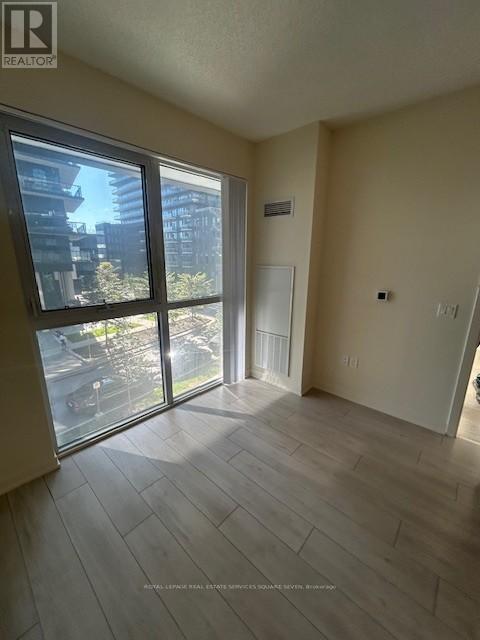 303 - 38 Annie Craig Drive, Toronto, Ontario  M8V 0G9 - Photo 2 - W12439256