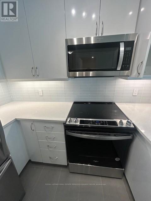 303 - 38 Annie Craig Drive, Toronto, Ontario  M8V 0G9 - Photo 5 - W12439256
