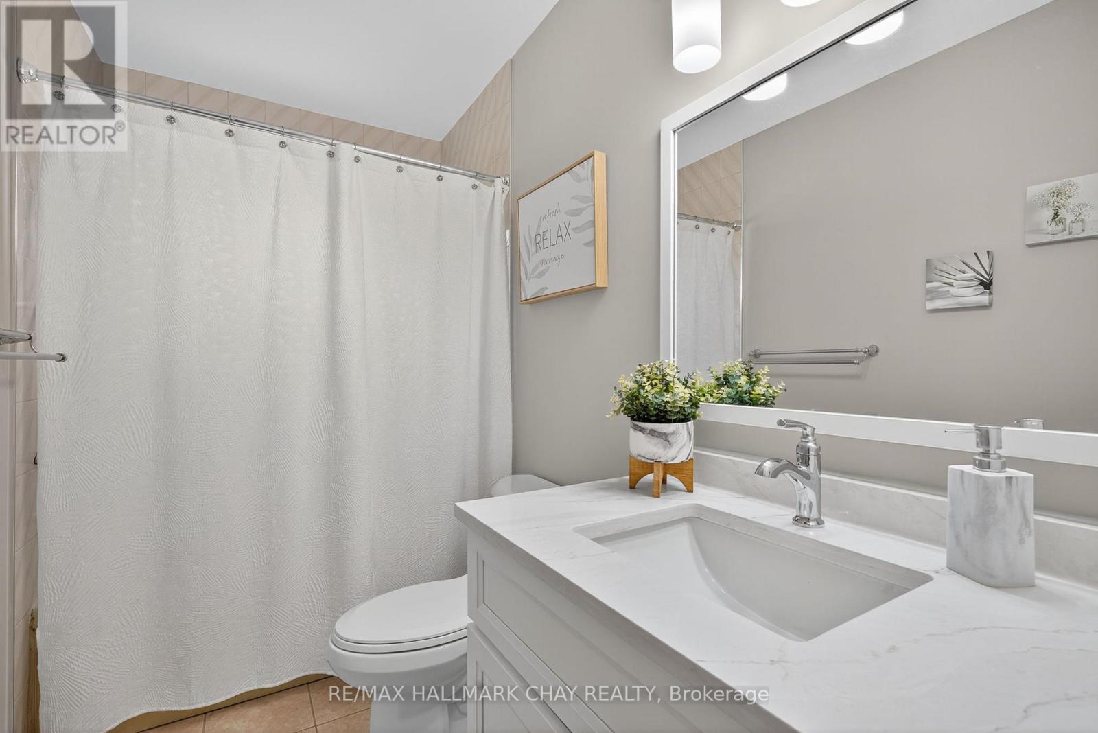 33 Parkette Drive, New Tecumseth, Ontario  L9R 1R7 - Photo 17 - N12439351