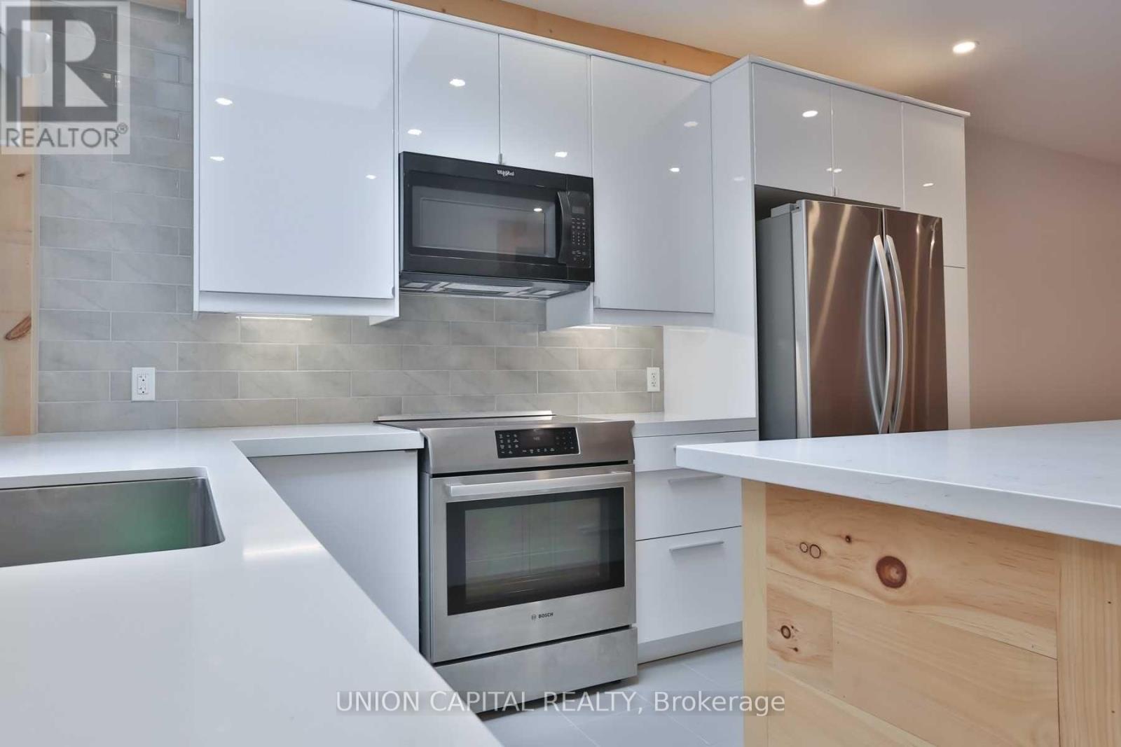 Main - 56 Ravina Crescent, Toronto, Ontario  M4J 3M2 - Photo 9 - E12438106