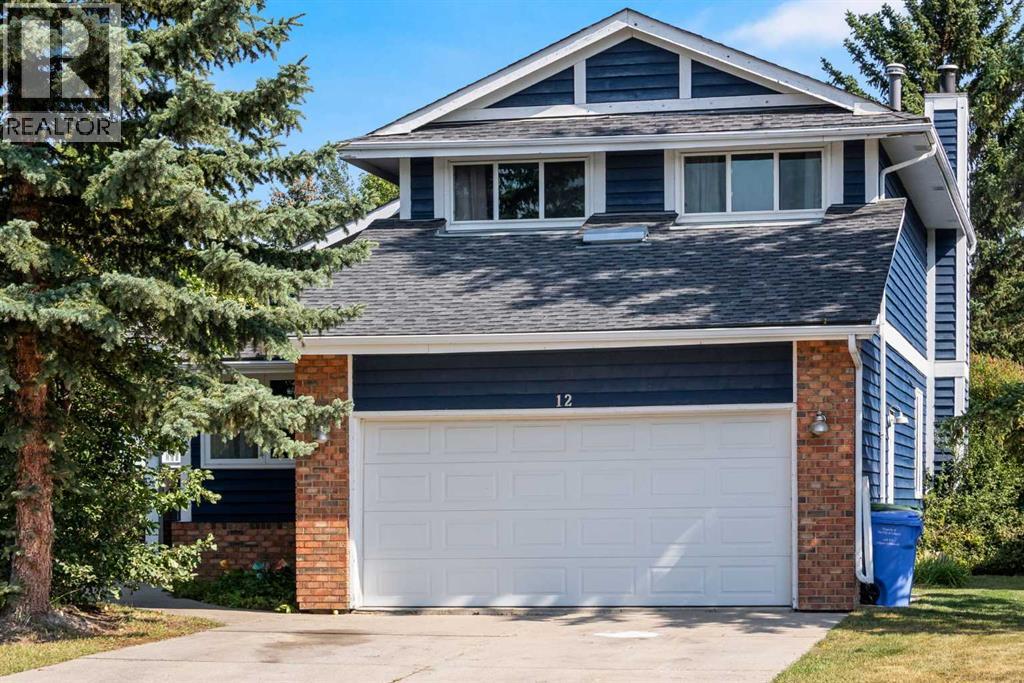 12 Deerbrook Bay Se, Calgary, Alberta  T2J 5Z8 - Photo 1 - A2254781