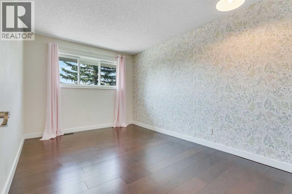 12 Deerbrook Bay Se, Calgary, Alberta  T2J 5Z8 - Photo 19 - A2254781