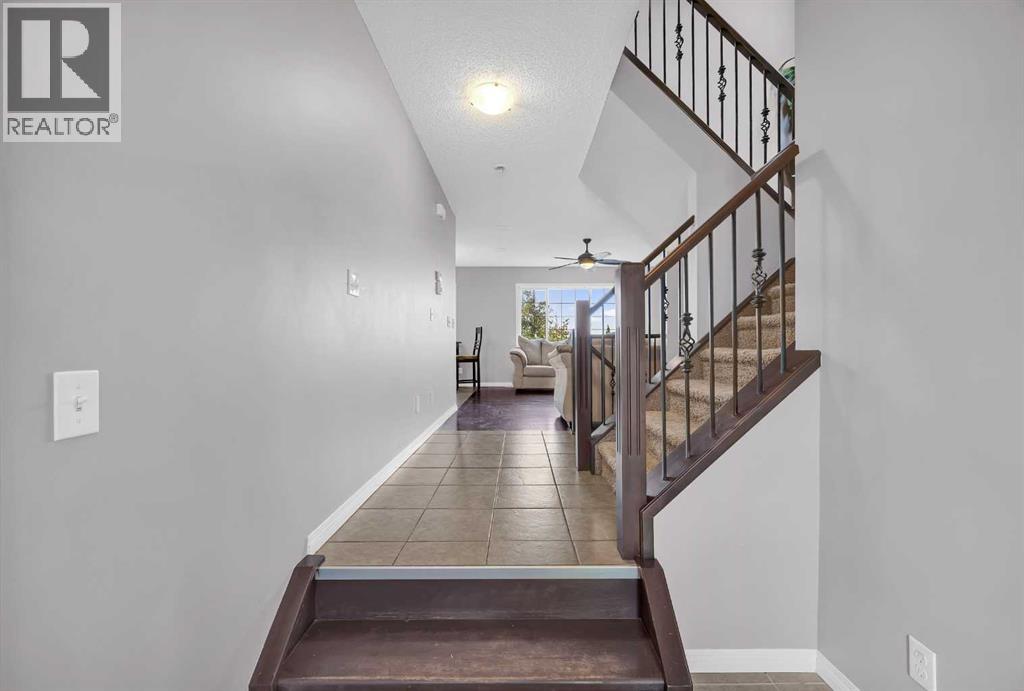 126 Windstone Avenue Sw, Airdrie, Alberta  T4B 3R3 - Photo 4 - A2257648