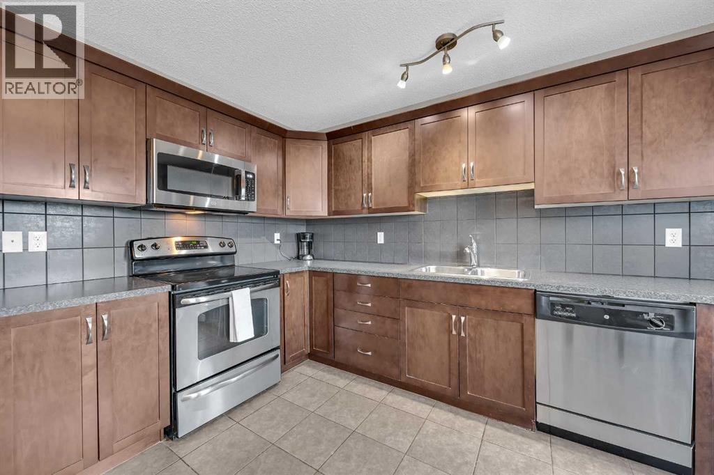 126 Windstone Avenue Sw, Airdrie, Alberta  T4B 3R3 - Photo 11 - A2257648