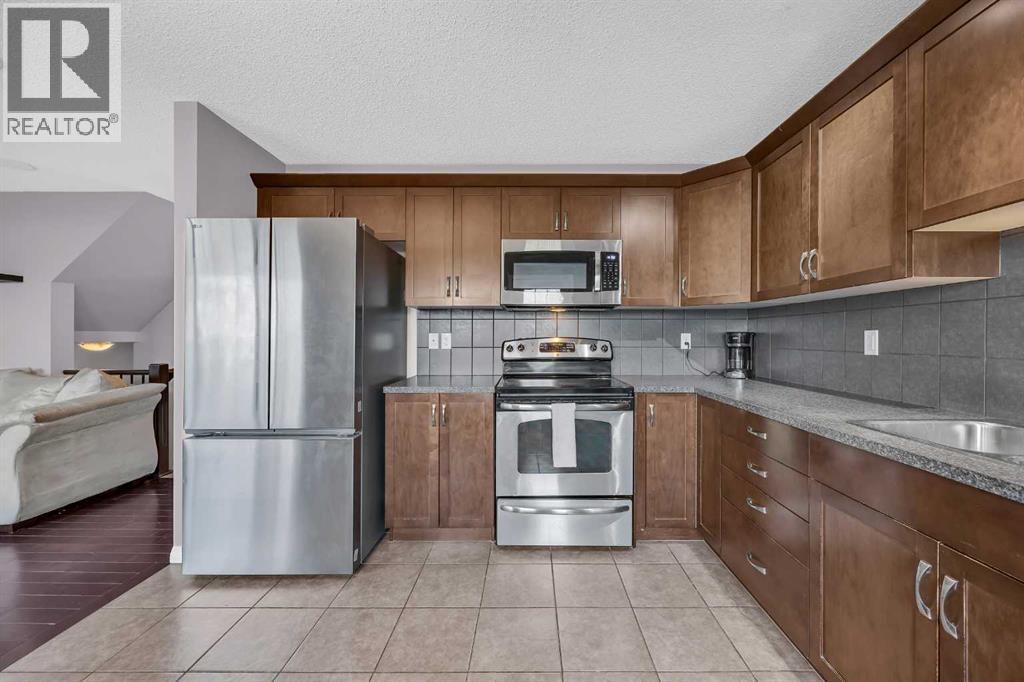 126 Windstone Avenue Sw, Airdrie, Alberta  T4B 3R3 - Photo 10 - A2257648