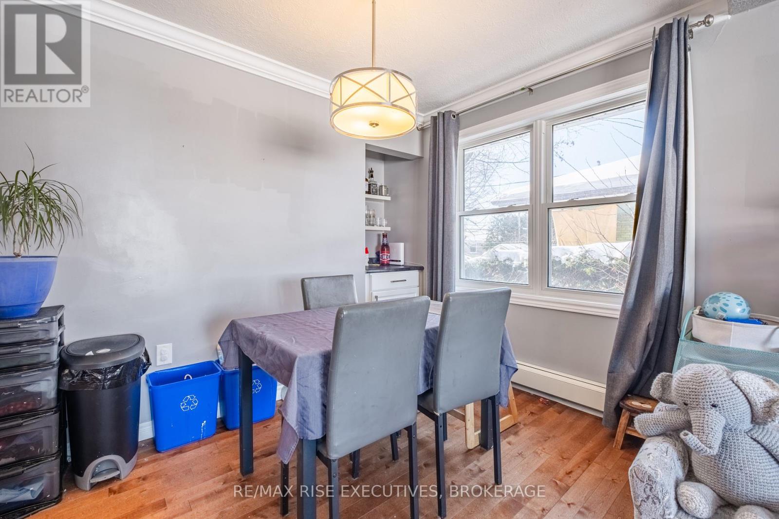 20 Elizabeth Avenue, Kingston, Ontario  K7M 3G8 - Photo 4 - X12439569