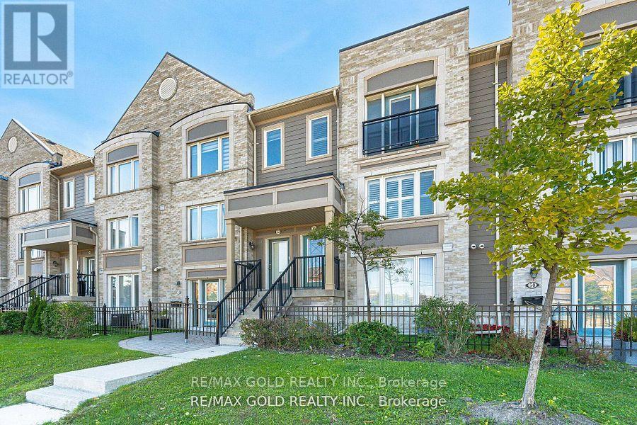 51 - 60 Fairwood Circle, Brampton, Ontario  L6R 0Y6 - Photo 2 - W12439459