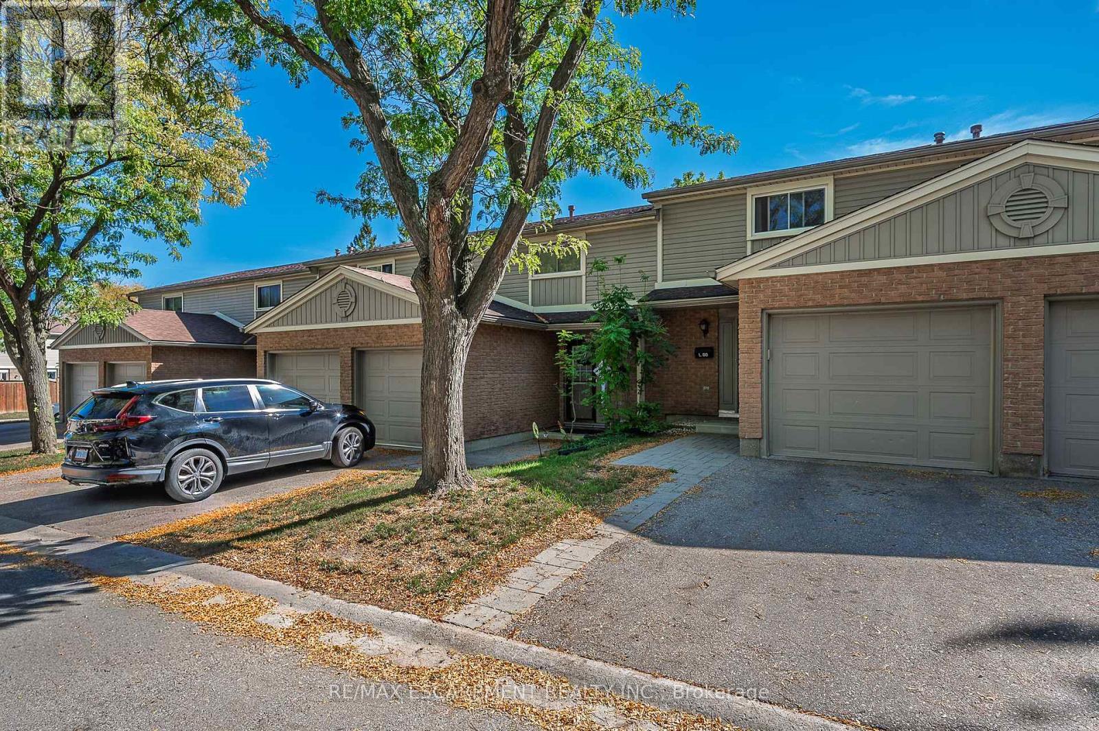 L80 - 223 Pioneer Drive, Kitchener, Ontario  N2P 1L9 - Photo 4 - X12422778