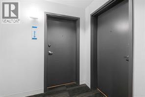 310, 1087 2 Avenue Nw, Calgary, Alberta  T3H 5L9 - Photo 5 - A2261171