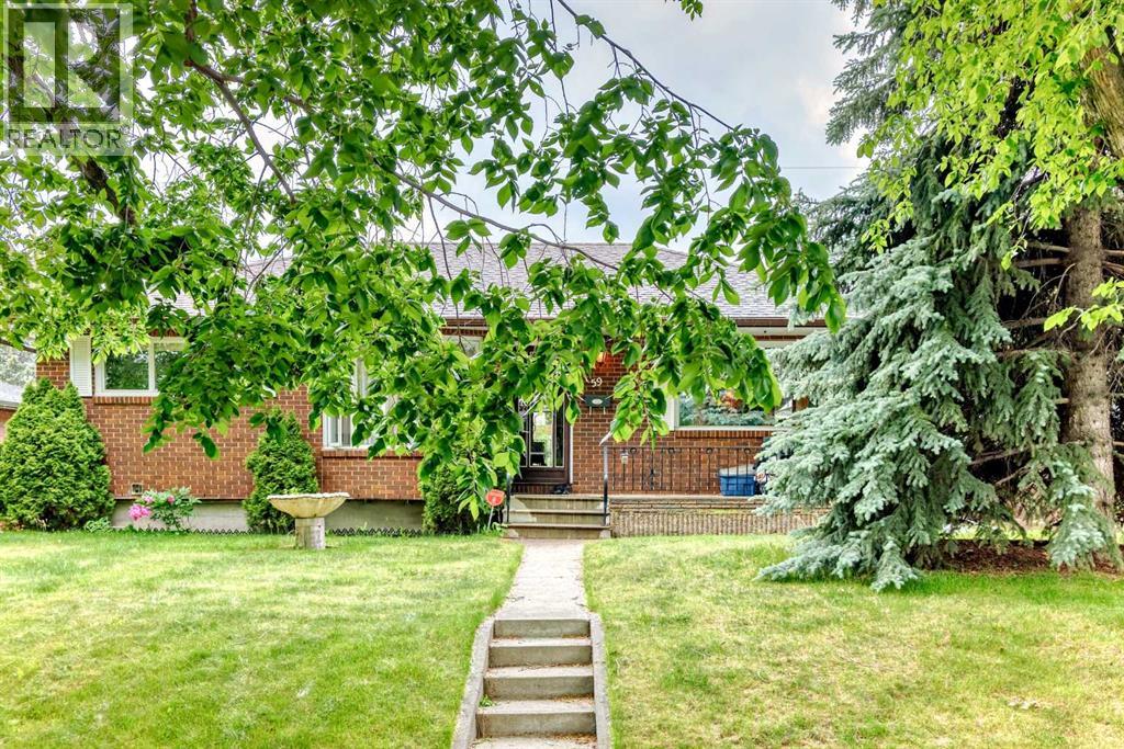 59 Rosewood Road Nw, Calgary, Alberta  T2K 1N3 - Photo 2 - A2261569